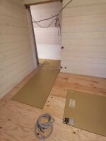 Отопление деревянного дома из бруса тёплым полом "Хотпанел".