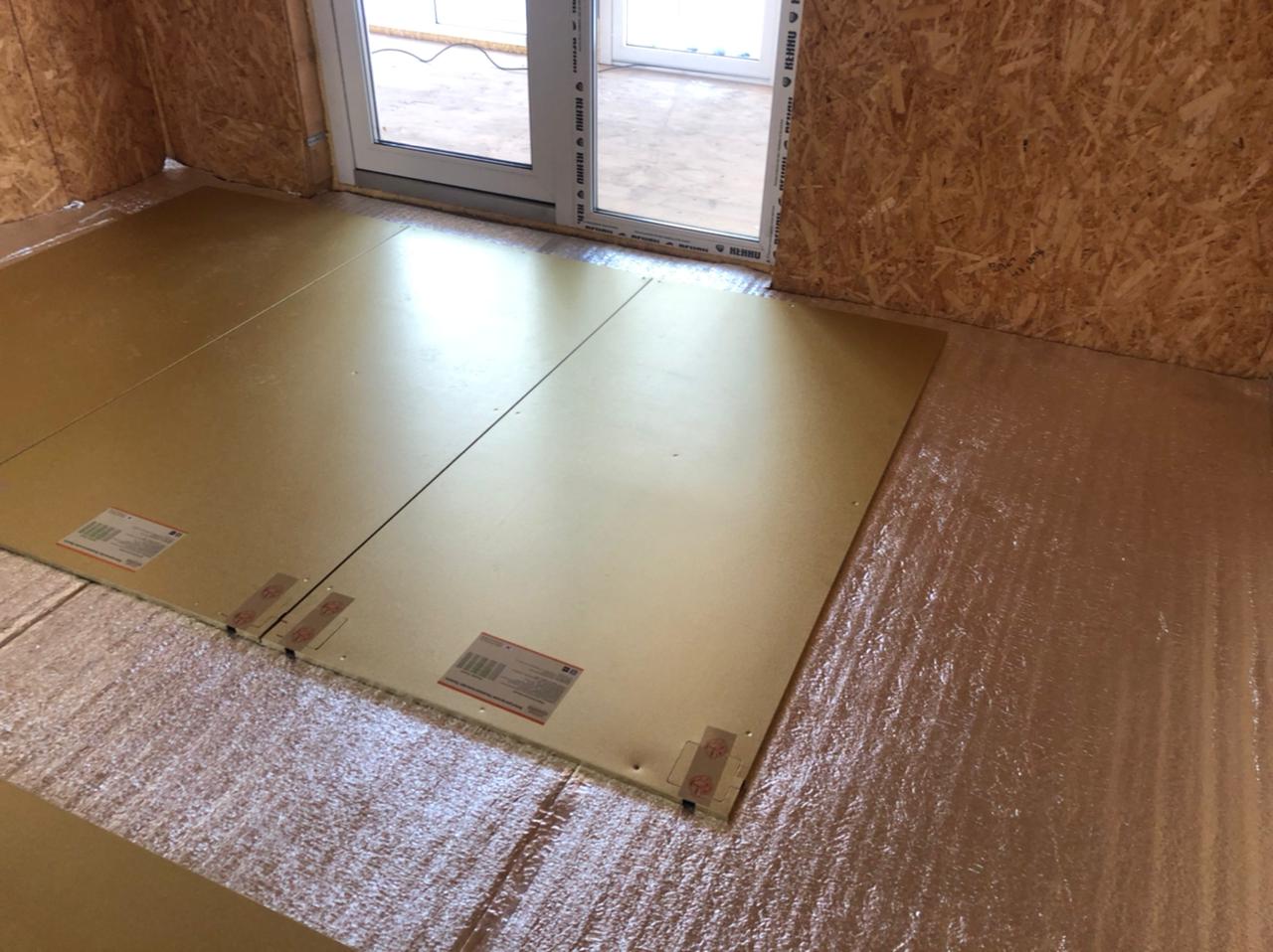 Продолжение монтажа теплого пола в доме из СИП-панелей с помощью электрических нагревательных панелей Хотпанел.