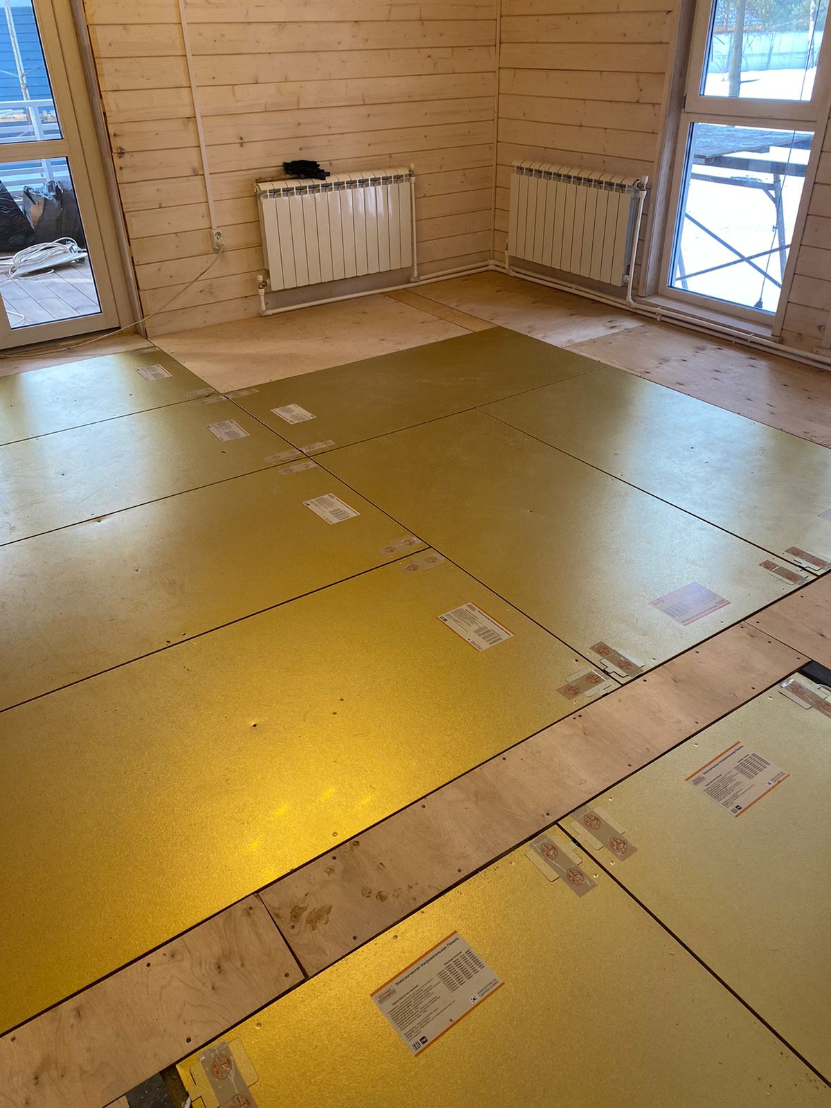 Отопление деревянного коттеджа теплым полом Хотпанел