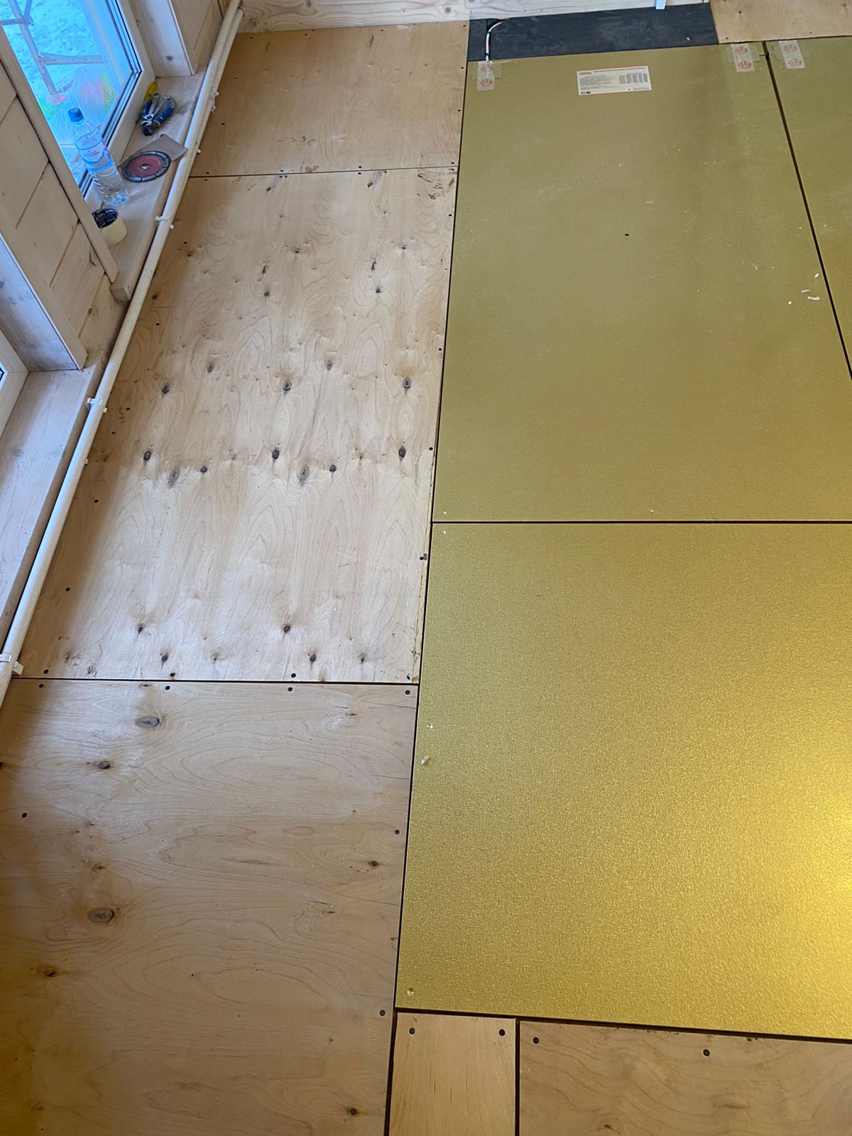 Отопление деревянного коттеджа теплым полом Хотпанел