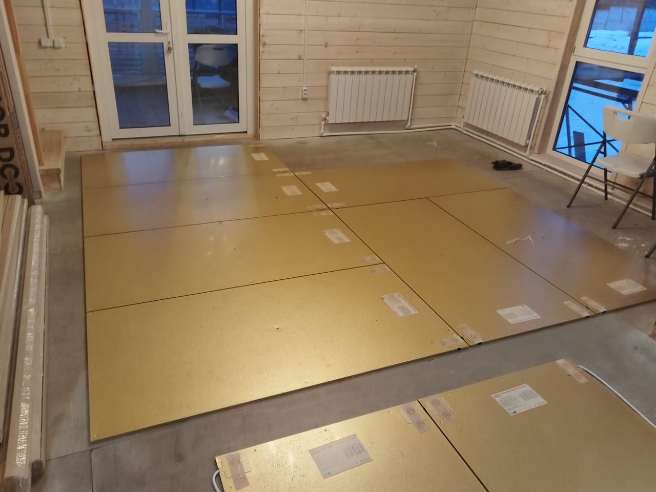 Отопление деревянного коттеджа теплым полом Хотпанел